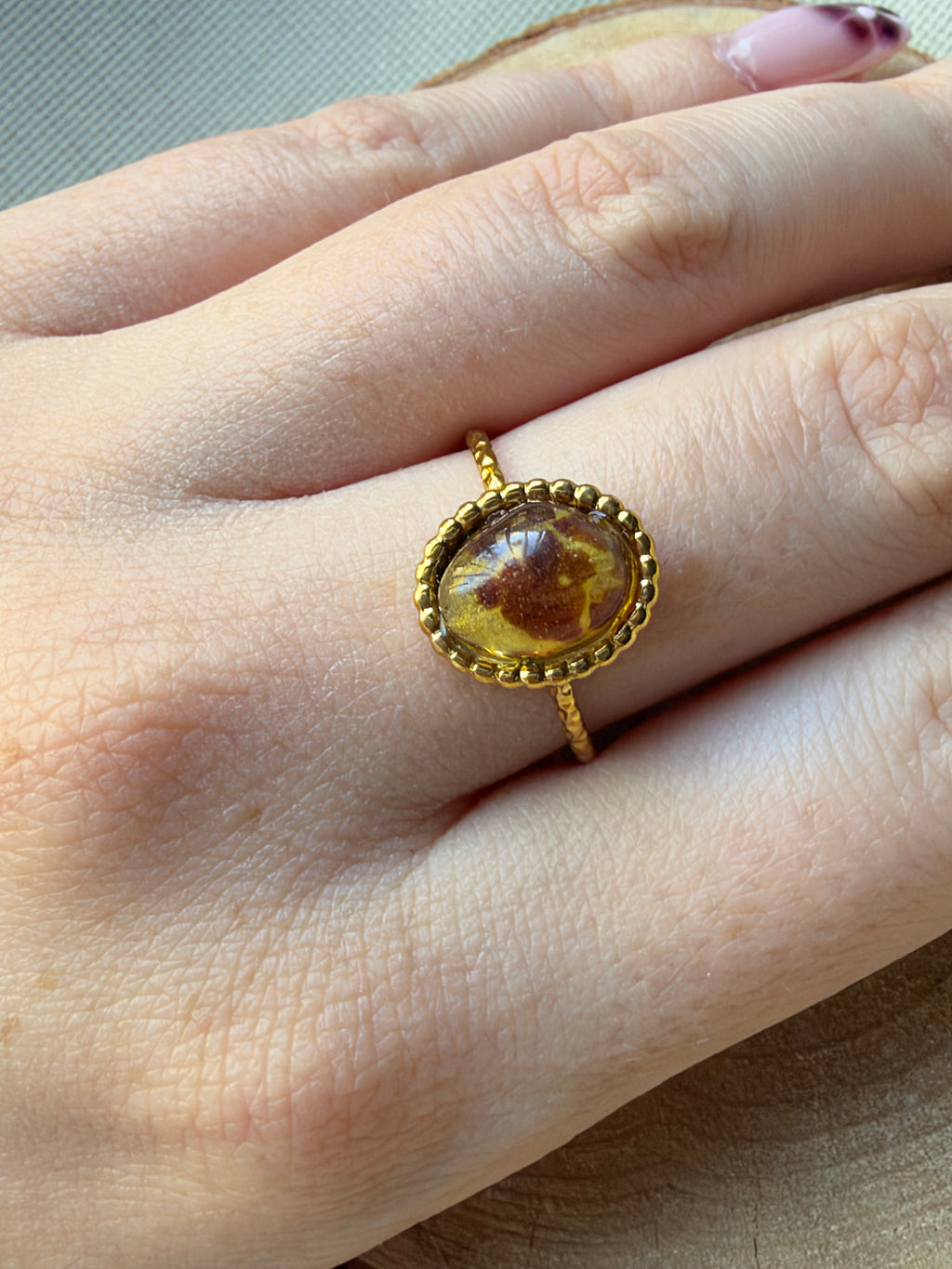 Anillo orquídea encapsulada
